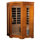 Golden wood infrared sauna with glass doors and black interior heating elements, viewed against white background
