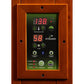Dynamic sauna control panel with wood frame displaying temperature and time settings, mounted on wood background