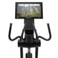 Black Freemotion e22.9 elliptical with dual curved handles, digital display screen showing fitness metrics, and tablet holder