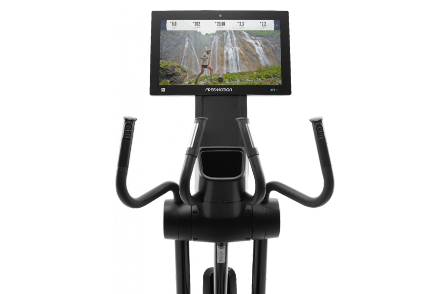 Black Freemotion e22.9 elliptical with dual curved handles, digital display screen showing fitness metrics, and tablet holder
