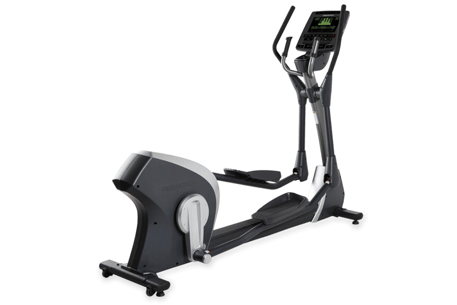 Black and silver elliptical machine with digital console display and foot pedals, shown on white background