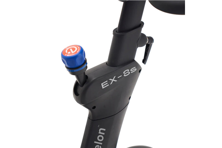 Black Echelon EX-8s stationary bike handlepost with blue and red resistance knob, close-up detail view