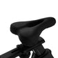 Black gel bike seat mounted on handlebars against white background