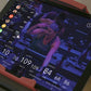 Echelon Connect Bike EX-3 tablet displaying indoor cycling workout metrics and instructor on screen