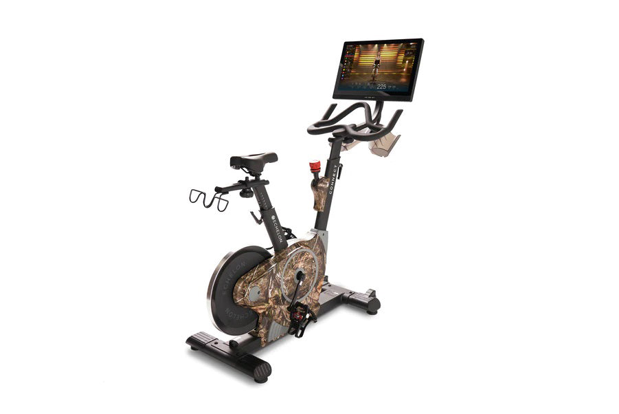 Echelon Smart Connect stationary exercise bike with camouflage frame, black handlebars, attached tablet displaying fitness cl