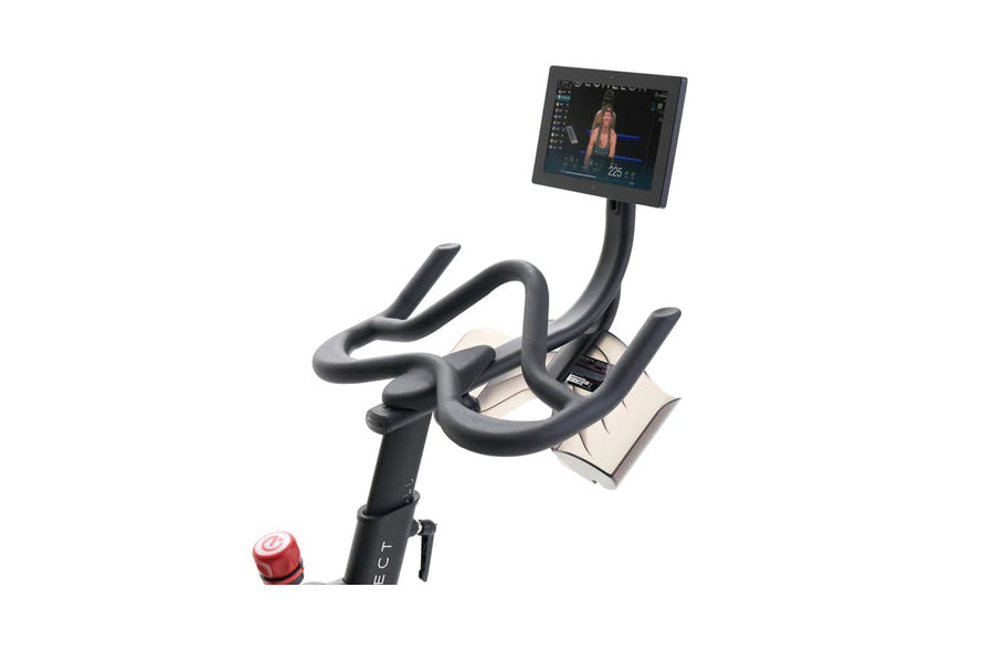 Echelon Smart Connect stationary exercise bike with black frame, curved handlebar grips, mounted touchscreen display, and red
