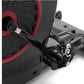 Black and red stationary exercise bike with pedal and adjustable seat, close-up detail view