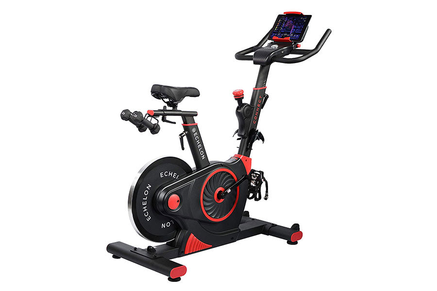 Echelon Connect Bike EX-3 stationary exercise bike with black frame, red accents, tablet holder, and dual dumbbells on white 