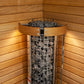 Harvia Cilindro electric sauna heater with metal grill basket filled with gray stones, wood band collar, and control dial, in