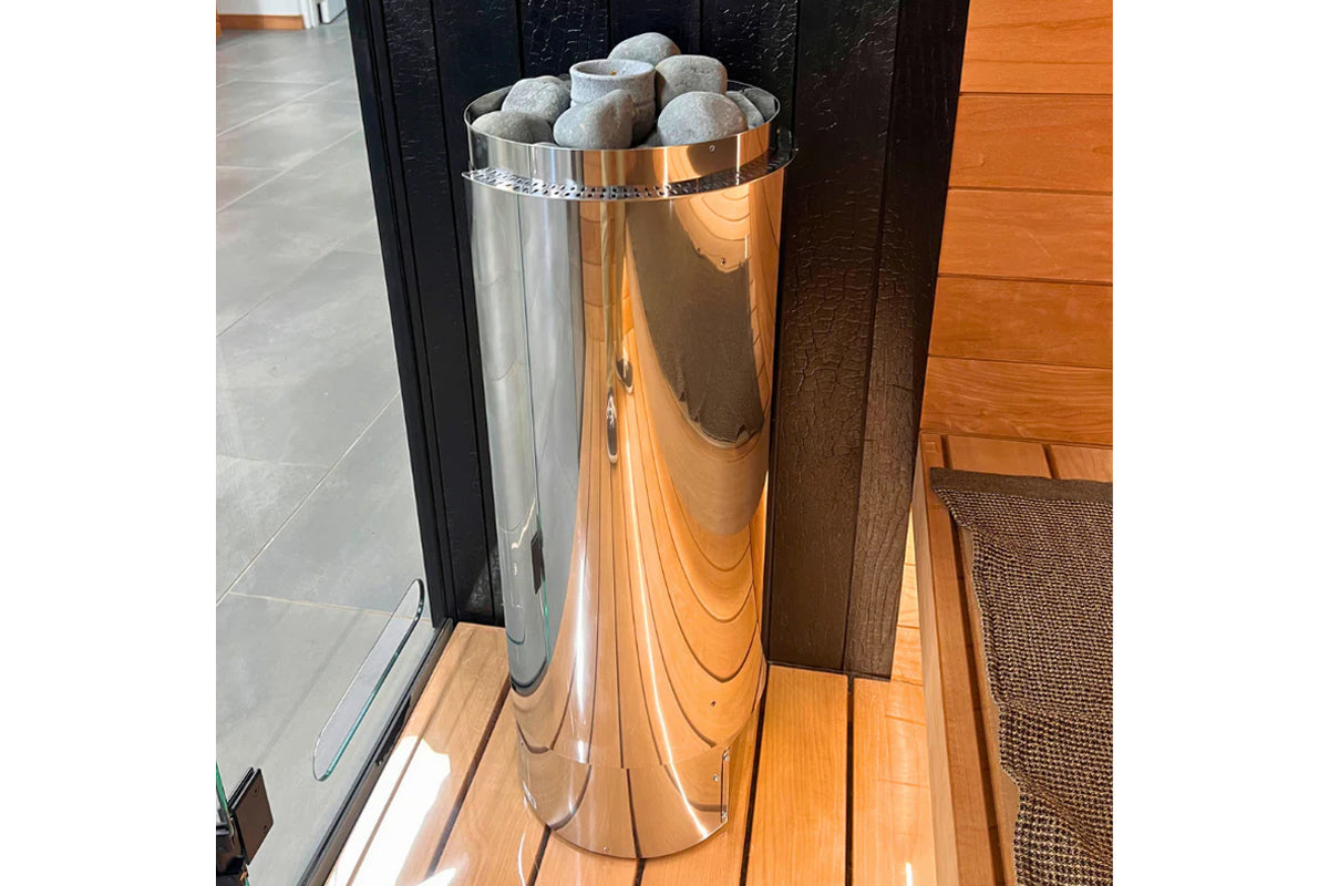 Harvia Cilindro electric sauna heater with stainless steel cylindrical body and decorative patterned rim, filled with gray he