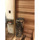 Harvia Cilindro cylindrical electric sauna heater with metal cage guard in wooden sauna room