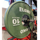 Eleiko green IWF training bumper plate 10kg mounted on red bar holder in gym setting