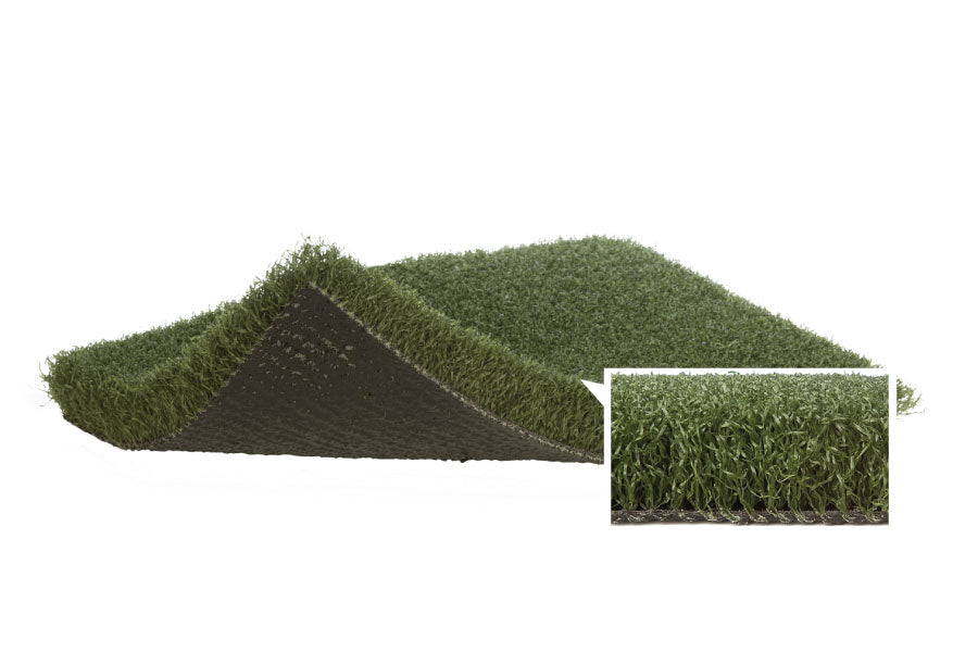Warrior Sports Performance Turf roll with green synthetic grass surface and dark rubber backing, showing close-up detail of b