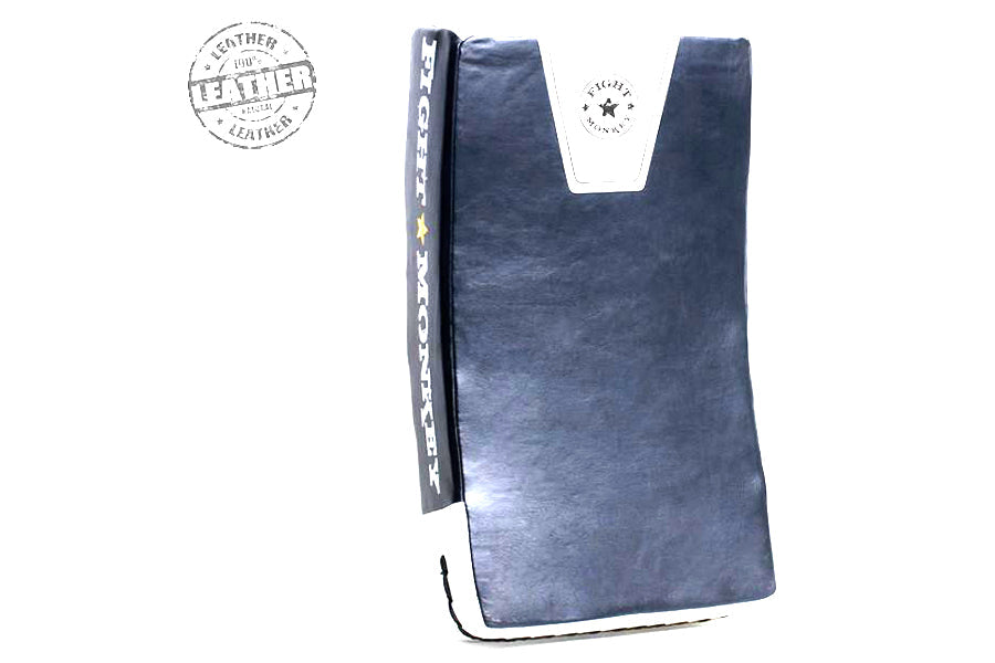 Navy and white leather kick shield with star detail and branded trim, flat lay on white background