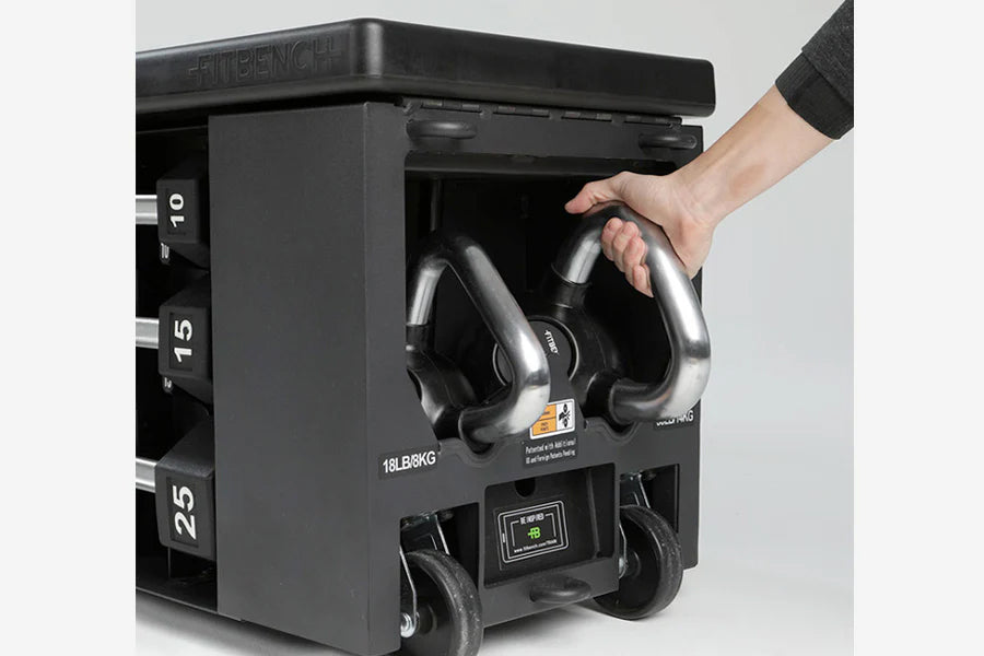 Black weight bench with dual curved handles, weight plates labeled 10, 15, and 25 pounds on side, digital display, worn by mo