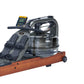 FluidRower Viking Pro V rowing machine with brown wood base, black handlebar, digital monitor, and transparent water tank on 