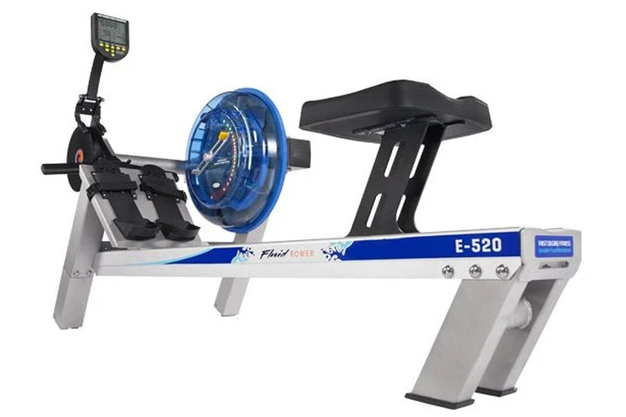 FluidRower E-520 commercial fluid rower with blue wheel, black seat and handles, digital console, on white background