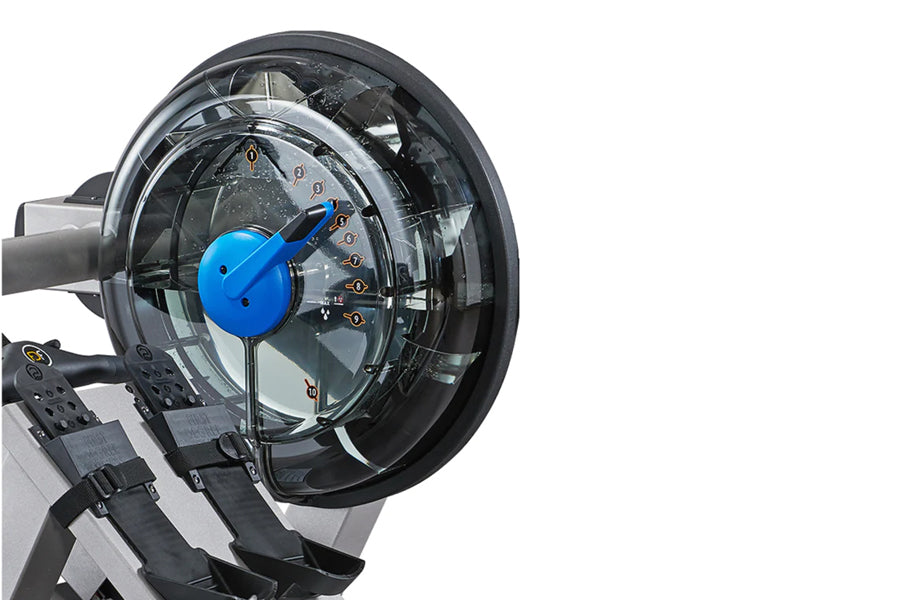 FluidRower E550 rowing machine with blue steering wheel and black foot pedals, shown against white background