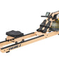 Tan and black Viking 2 Plus Select fluid rower with black seat, digital display, and water resistance tank, shown on white ba