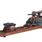 Viking 3 Plus brown fluid rower with black footrest and handles, water tank visible on right side