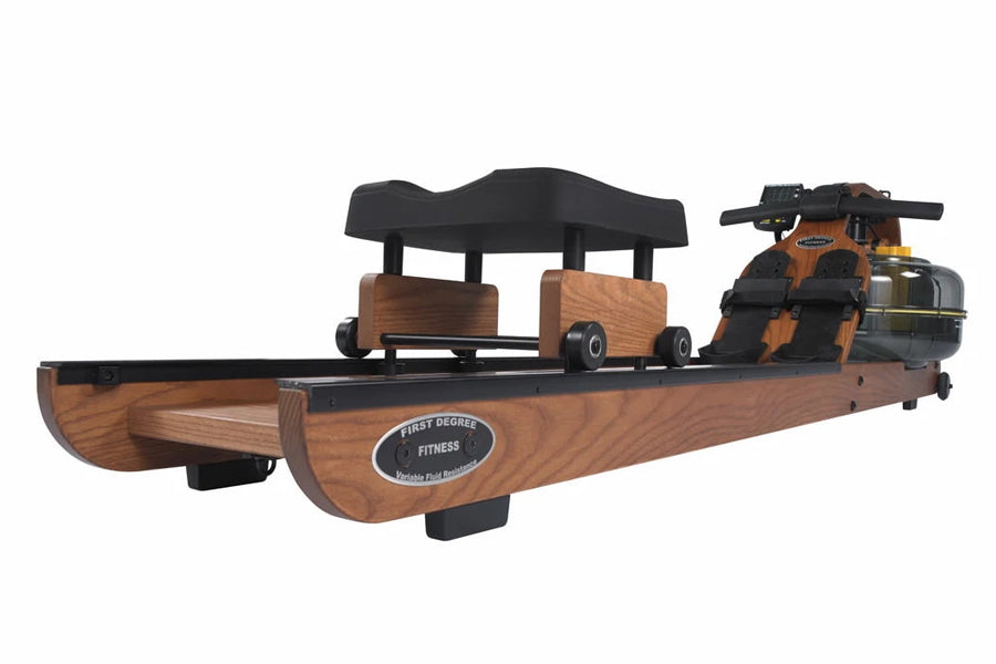 FluidRower Viking 3 wooden rowing machine with black accents and fluid resistance tank on white background
