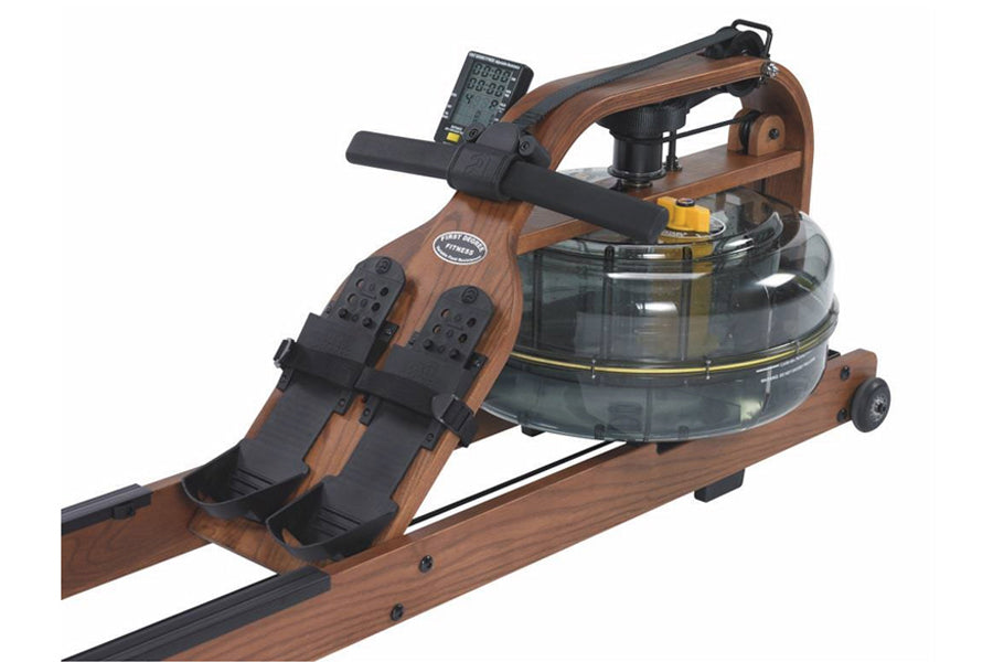 Viking 3 wooden frame rowing machine with brown wood construction, black footrests, black handlebar, digital monitor, and cle