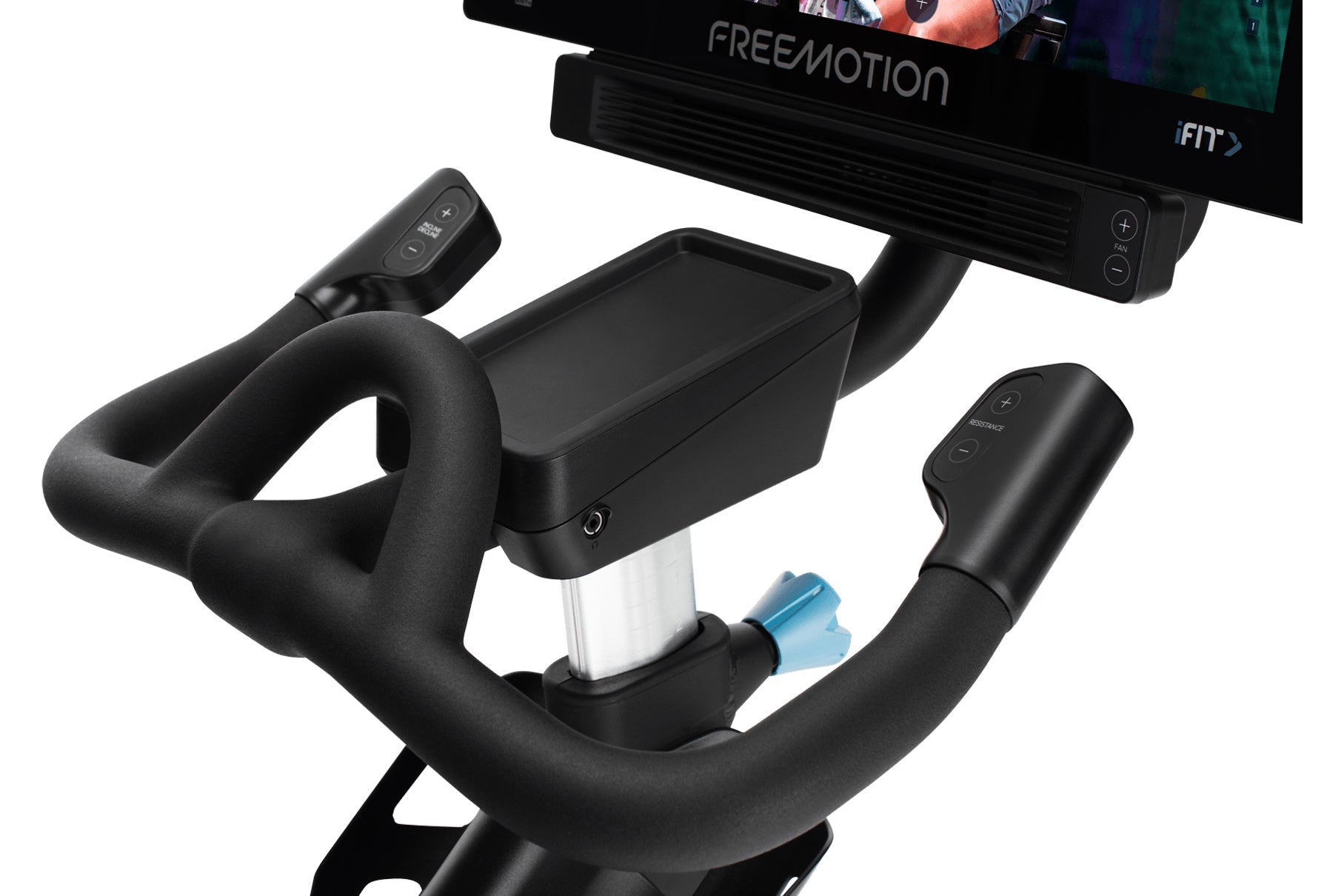 Black stationary exercise bike with padded handlebars, tablet holder, and digital console displayed with screen and remote co