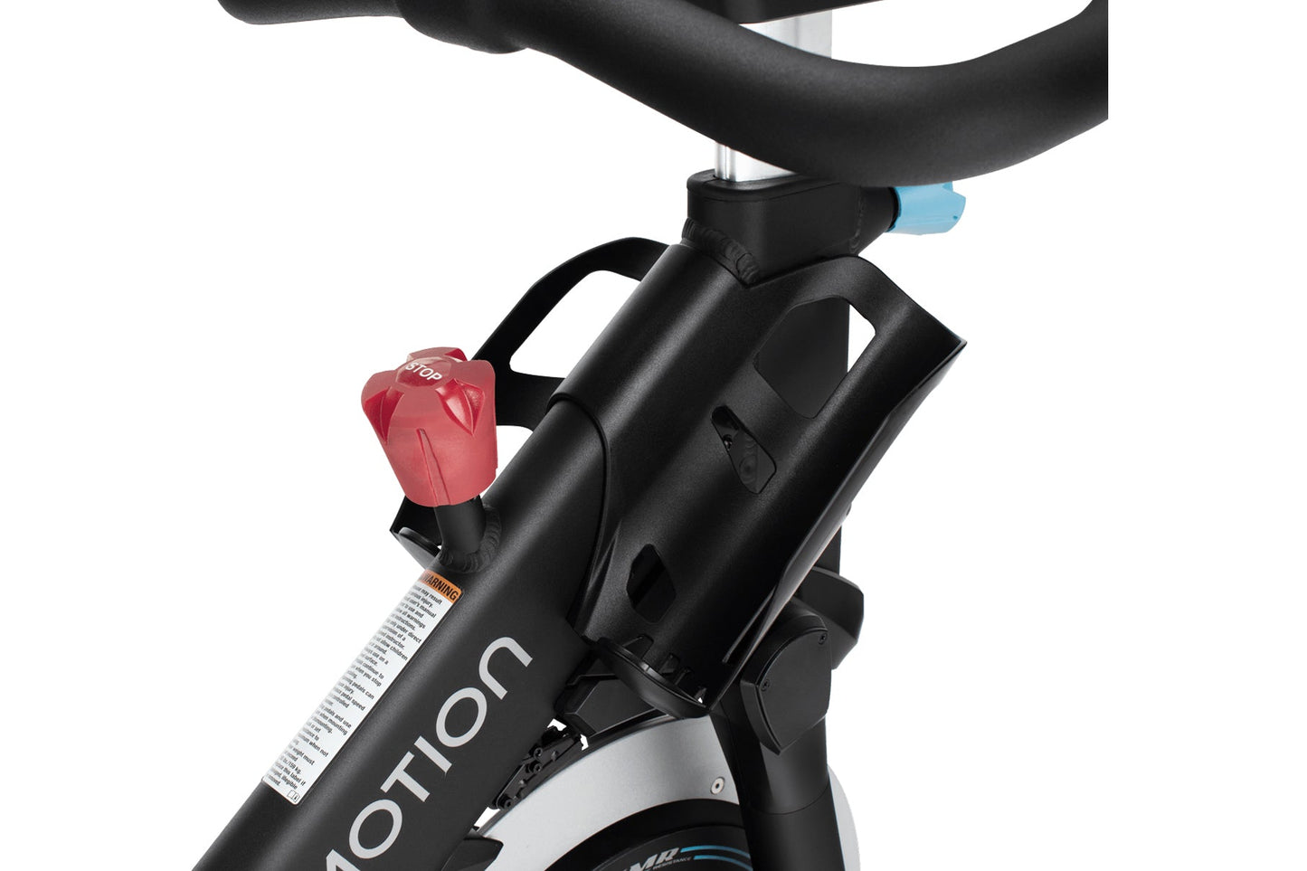 Black and white stationary indoor exercise bike with red resistance knob and blue indicator light on frame
