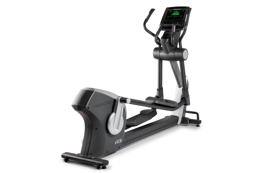 Freemotion e10.9b elliptical machine with black frame, white accents, digital display console, and foot pedals on white backg