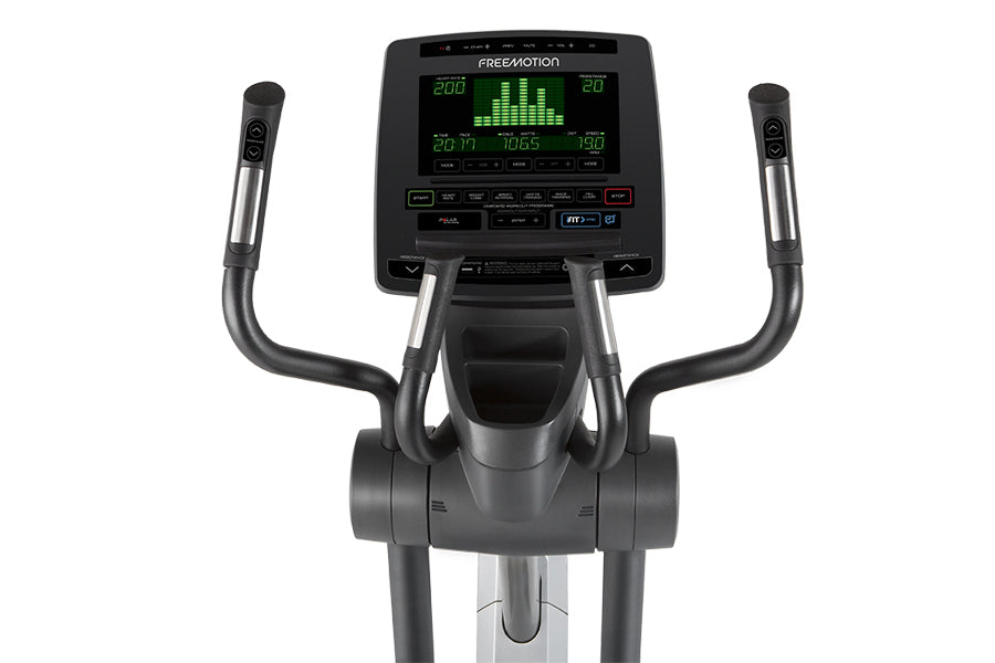 Black Freemotion e10.9b elliptical with digital console displaying green equalizer display, curved handles, and foot pedals o