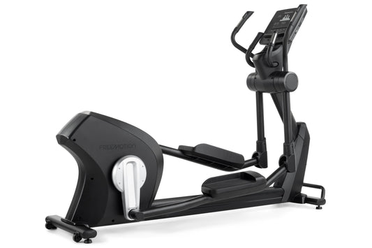 Black Freemotion elliptical machine with digital console, curved handles, and foot pedals on white background