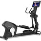 Freemotion e22.9 black elliptical machine with interactive touchscreen display and dual handlebar grips on white background