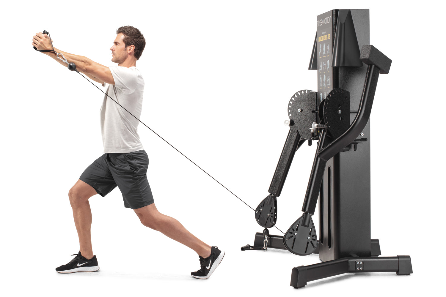 Man in white shirt and black shorts using black Freemotion dual cable cross machine with digital display, demonstrating cable