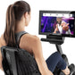 Woman using Freemotion R22.9 recumbent exercise bike with digital display screen showing fitness metrics and instructor