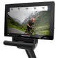 Freemotion R22.9 recumbent exercise bike displaying cycling workout metrics on black screen with mounted stand