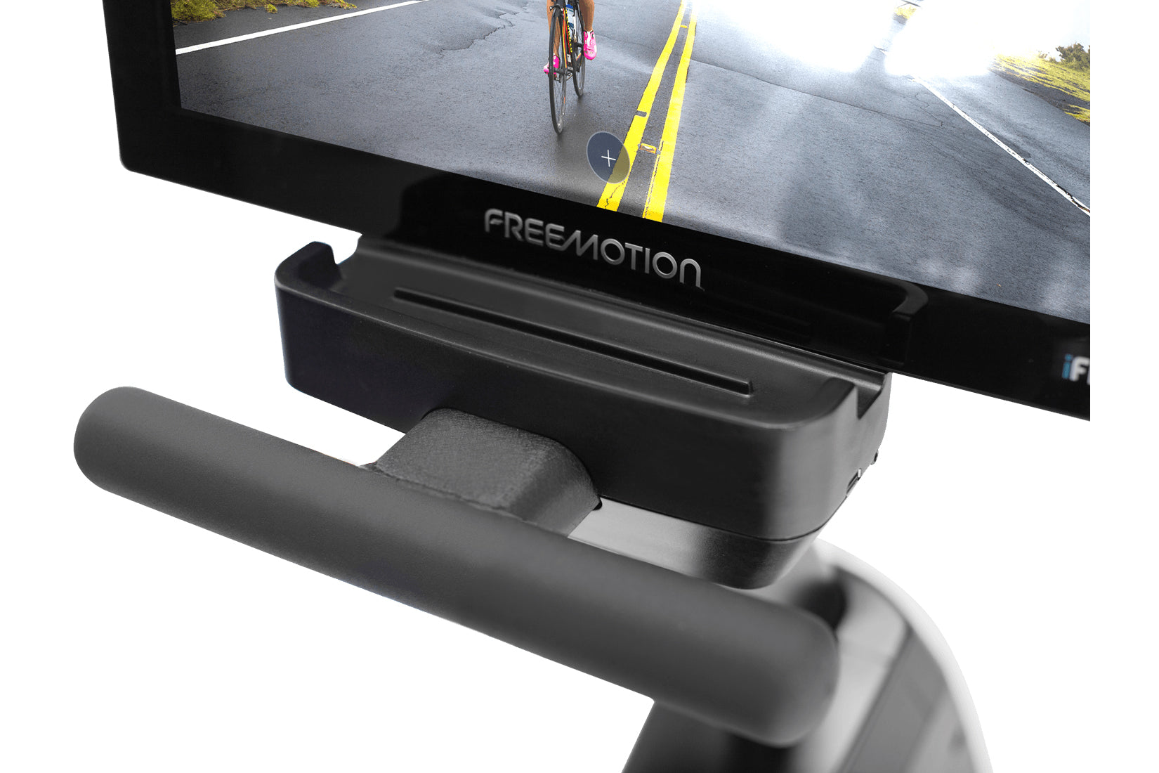 Freemotion r22.9 recumbent exercise bike with black frame and digital display showing cycling road scene