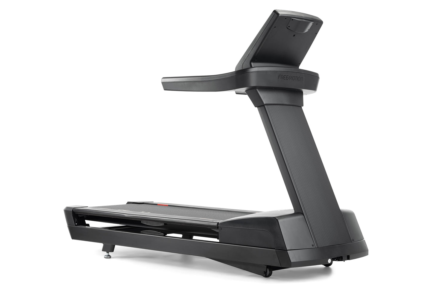 Black Freemotion REFLEX treadmill with digital display console, textured running belt, and curved support frame on white back
