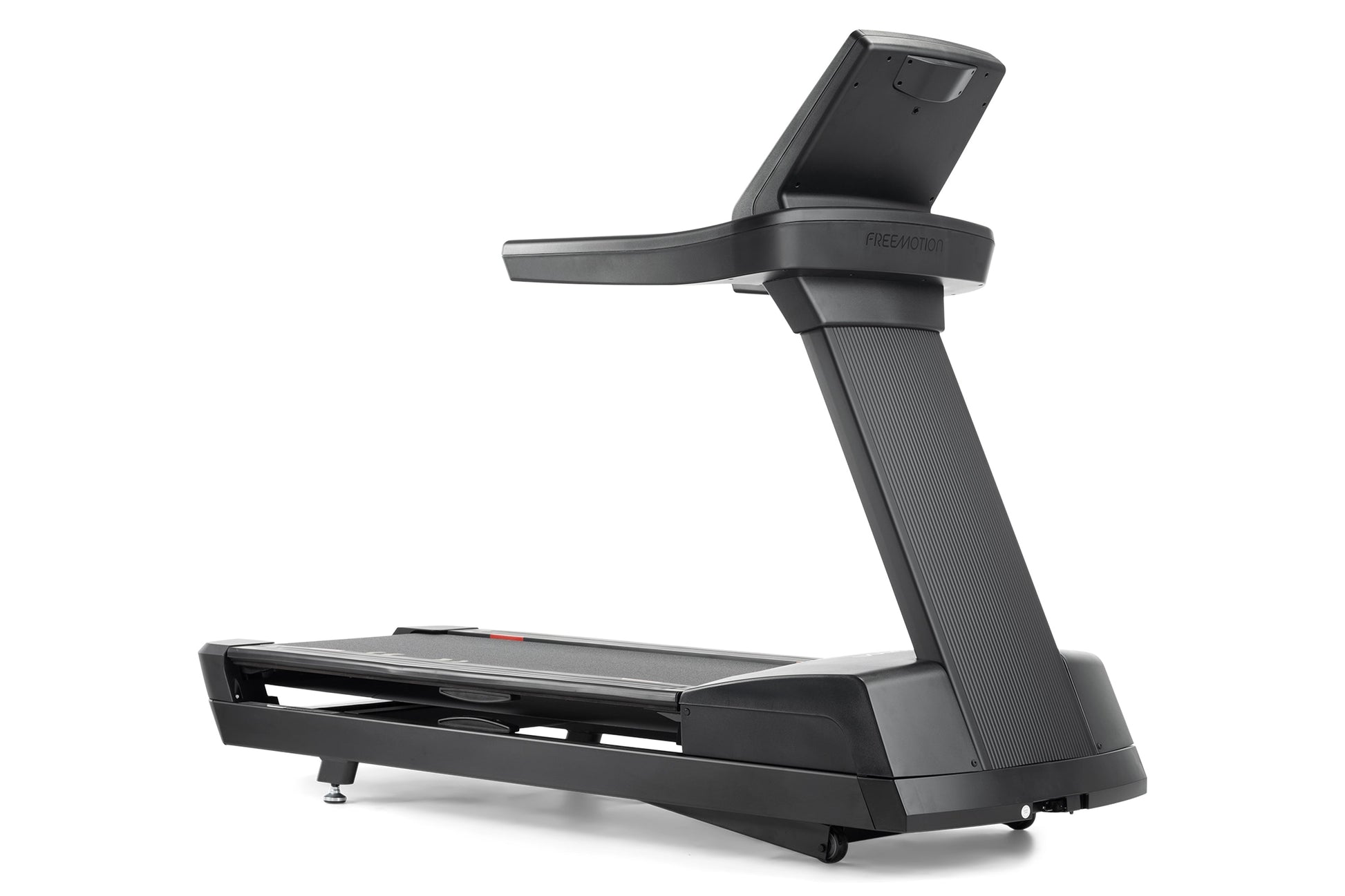 Black Freemotion REFLEX treadmill with digital display console, textured running belt, and curved support frame on white back