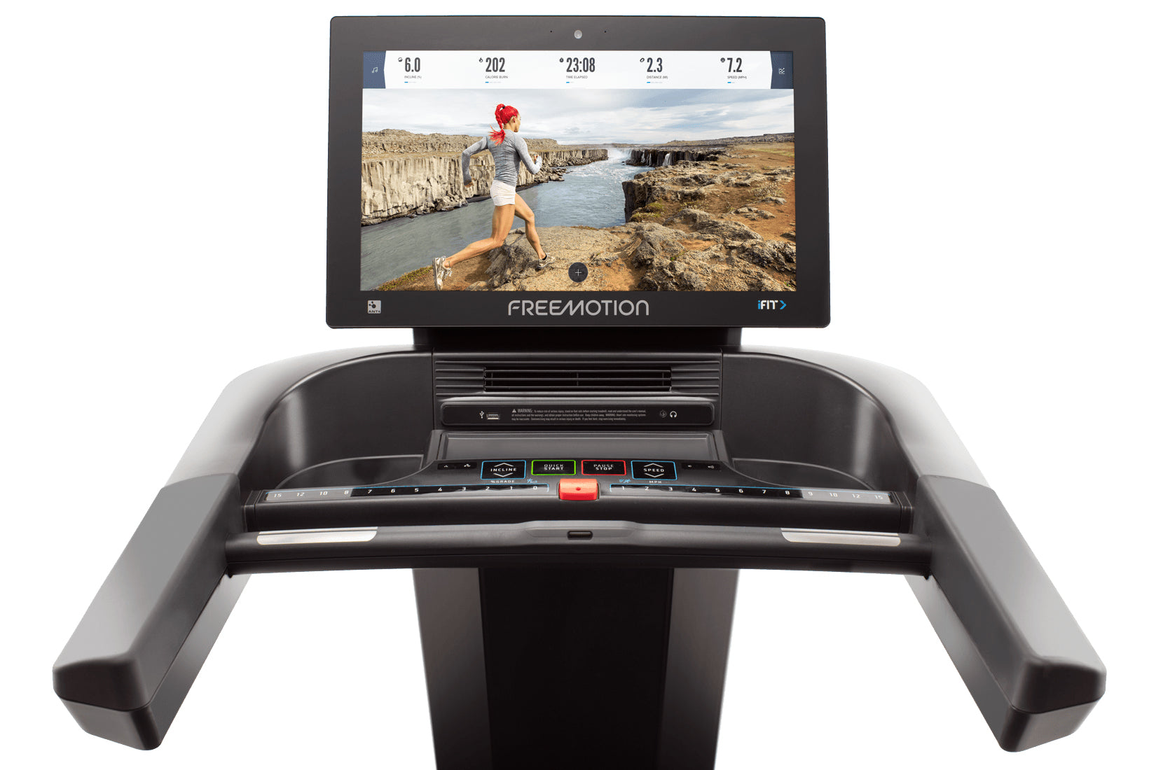 Freemotion t22.9 REFLEX treadmill with black frame, touchscreen display showing runner on rocky landscape, and control panel 