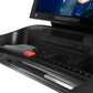 Freemotion t22.9 REFLEX treadmill console with red emergency stop button and numbered speed controls on black dashboard