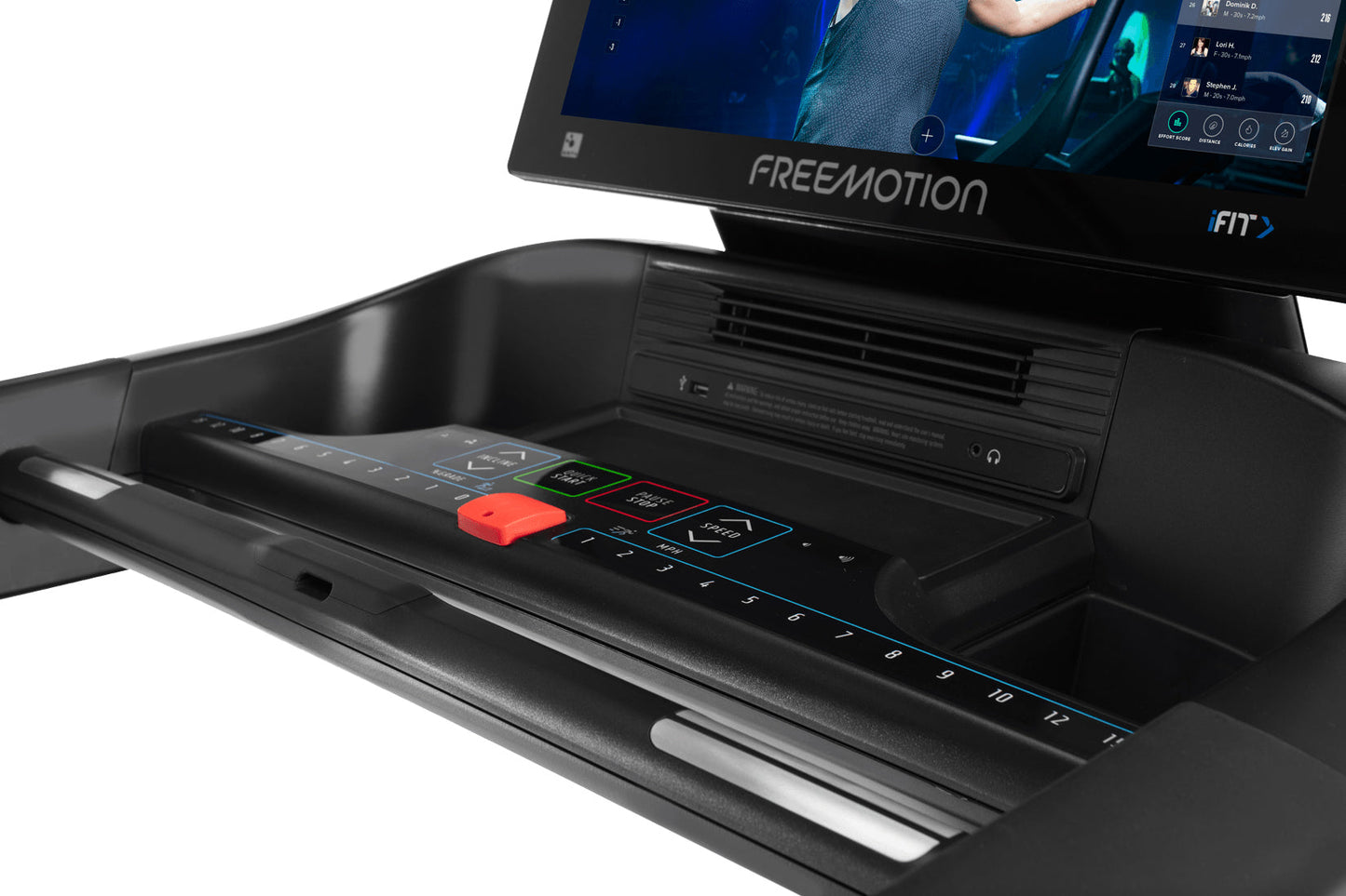 Freemotion t22.9 REFLEX treadmill console with red emergency stop button and numbered speed controls on black dashboard