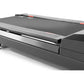 Black treadmill with gray accents, digital display console, red safety key, and aluminum handrails on white background
