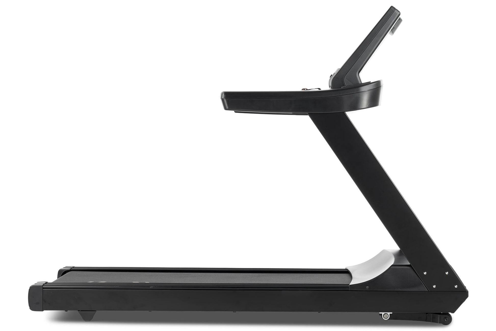 Black Freemotion treadmill with angled running deck, digital display console, and adjustable handrails on white background