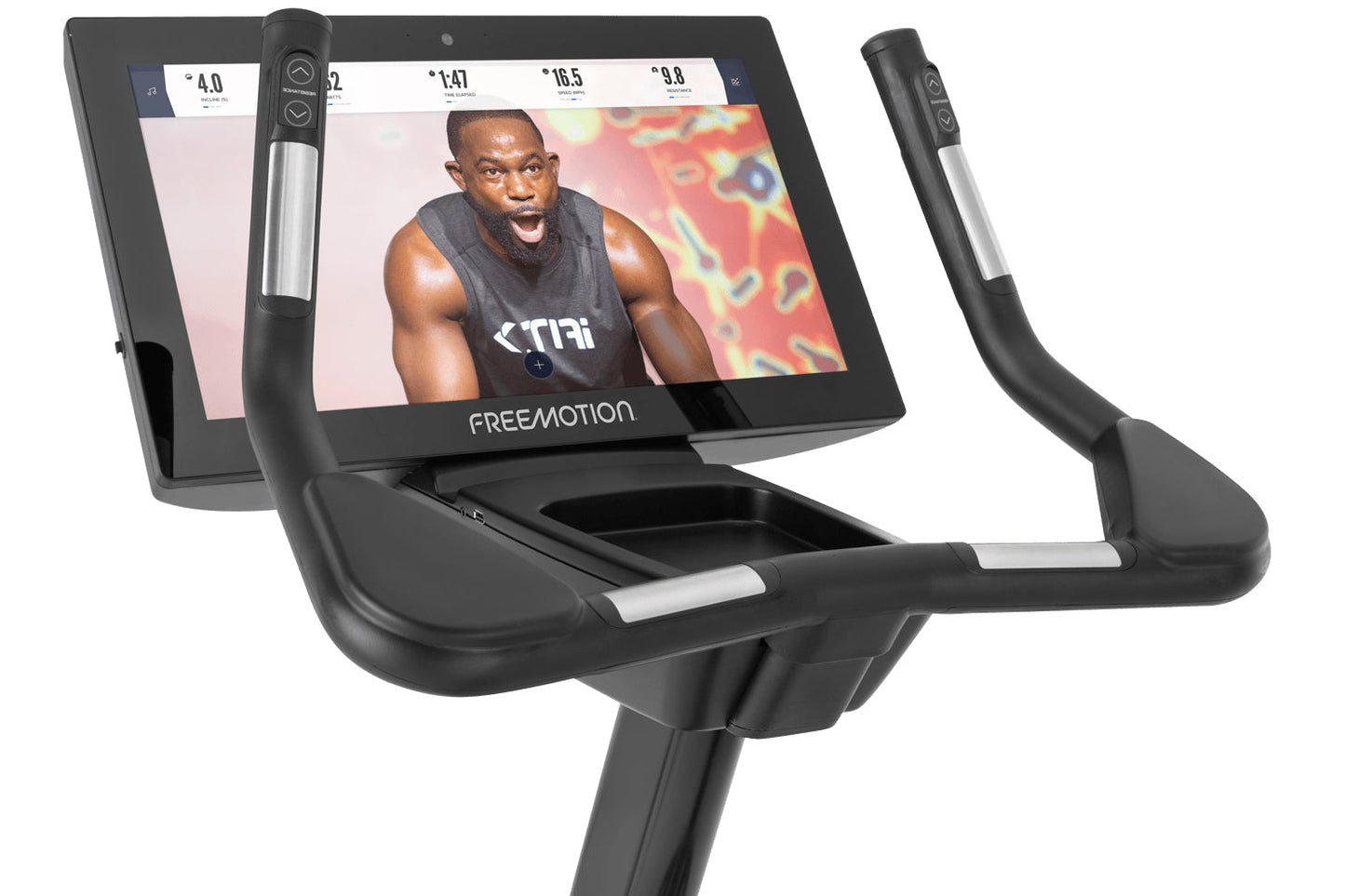 Freemotion u22.9 upright exercise bike with black frame, silver accents, digital display screen, and dual handlebars