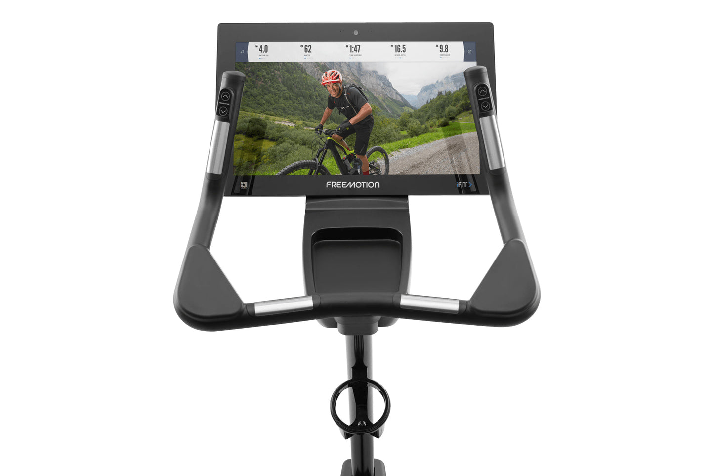 Freemotion u22.9 upright exercise bike with black and gray frame, digital display showing cyclist on mountain road, and built