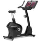 Freemotion u22.9 black upright exercise bike with digital display console and padded seat, on white background