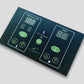Dark teal sauna control panel with green illuminated buttons, digital temperature and timer displays, power and heat controls