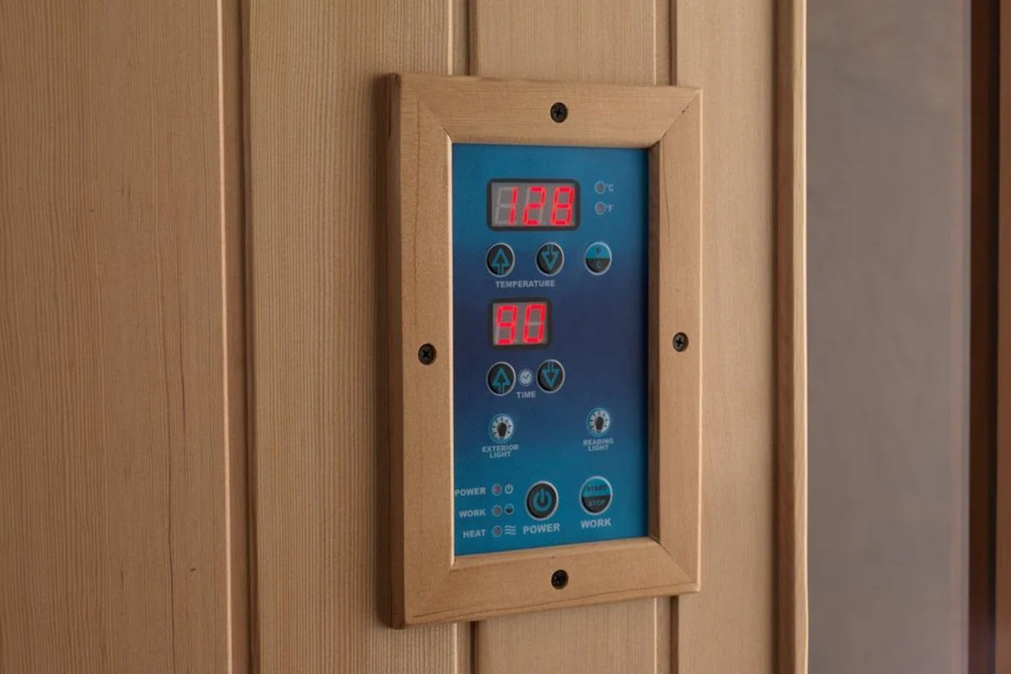 Wood-framed sauna control panel with blue faceplate, red LED temperature display showing 128 degrees and timer display showin