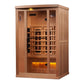 Golden Designs 2-3 person infrared sauna with cedar wood exterior, glass door, interior wood benches, and glowing amber heat 