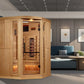 Natural wood corner infrared sauna with glass door, interior red heat elements, and control panel, displayed in modern room s